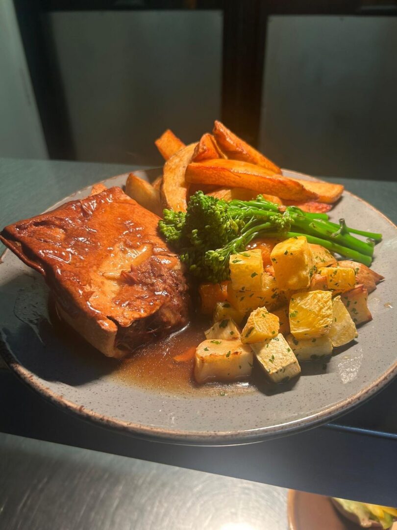Steak with vegetables and fries
